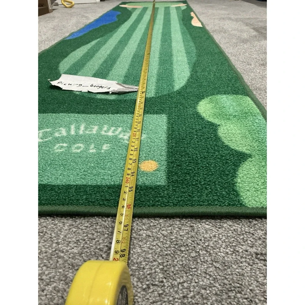 Callaway Golf branded putting mat, detailed fairway design with a putting green